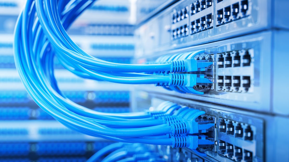 Network cables connected to server rack.