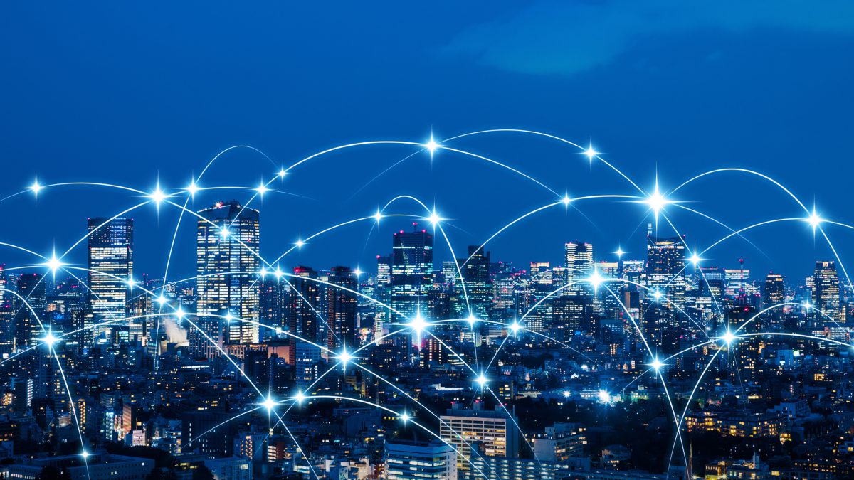 City skyline with glowing network connections.