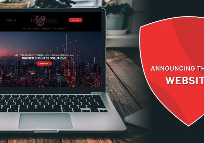 Laptop displaying new website announcement.